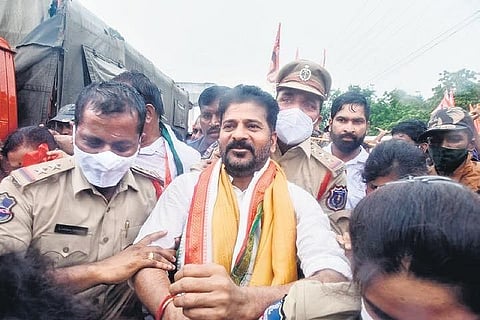 Police prevent TPCC president A Revanth Reddy from staging a protest at Uppal bus depot on Monday. (Photo | Vinay Madapu)