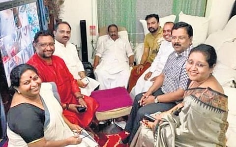 KPCC chief K Sudhakaran and former Chief Secretary Jiji Thomson with Monson