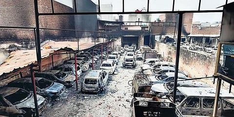 File image of charred vehicles set ablaze by rioters at Shiv Vihar area of the riot-affected Northeast Delhi.