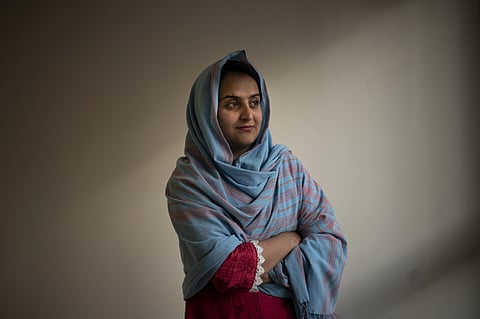 Behishta Arghand, a news anchor for the privately owned broadcaster Tolo News, poses for a photo inside a compound in Doha, Qatar on Sunday, Aug. 29, 2021. (Photo | AP)