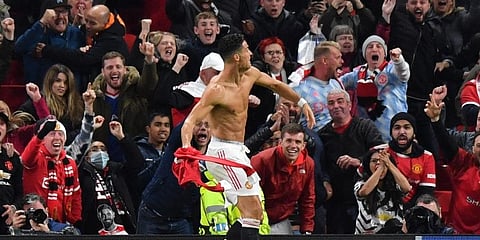 Manchester United's Cristiano Ronaldo celebrates scoring his team's second goal during the UEFA Champions league game against Villarreal at Old Trafford stadium. (Photo | AFP)