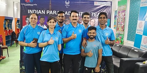 Coach Gaurav Khanna with Indian para shuttlers.