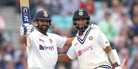 India's Rohit Sharma (L) celebrates scoring 100 againsy England, with partner Cheteshwar Pujara. (Photo | AP)