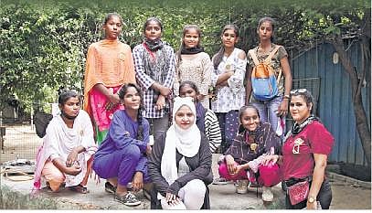 The nine food-walk tour guides with Farheen Naaz of Purani Dilli Walo Ki Baatein (also pictured below)