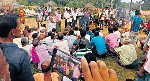 Villagers staging protest in Dhinkia panchayat on Sunday. (Photo | Express)