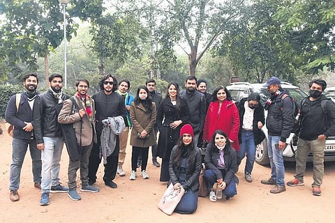 Shah Umair (left) and Abu Sufiyan (third from left)with participants of a walk in January 2021