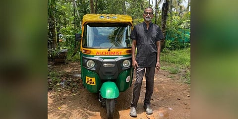 Pradeep with his autorickshaw at his home at Cherai in Ernakulam
