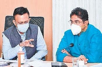 BBMP chief Gaurav Gupta and Minister R Ashoka during a meeting on Monday