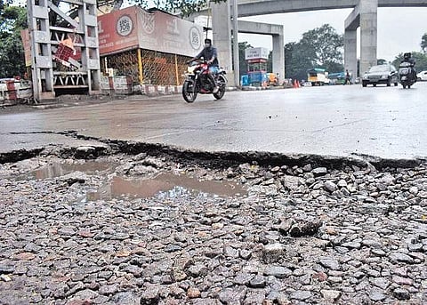 Road damaged due to recent continuous rains in Hyderabad. (Photo | Express)