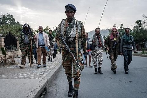 In this file photo taken on June 29, 2021 Rebels that are pro-TPLF (Tigray People's Liberation Front) arrive after 8 hours of walking in Mekele, the capital of Tigray region, Ethiopia. (Photo | AFP)