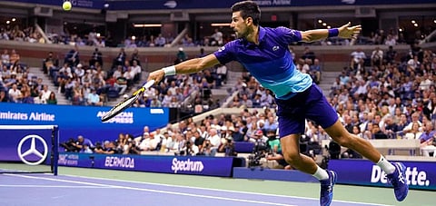 Novak Djokovic, of Serbia, stretches to hit a return to Matteo Berrettini, of Italy, during the quarterfinals of the U.S. Open tennis tournament Wednesday, Sept. 8, 2021, in New York. (Photo | AP)