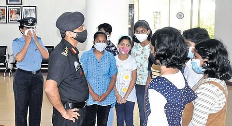 Sainik School principal Colonel Dhirendra Kumar interacting with the first batch of girls at Kazhakootam in Thiruvananthapuram on Wednesday