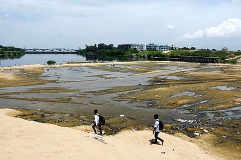 Illegal sand mining from the Cooum mouth near Napier bridge. (Photo | Ashwin Prasath, EPS)