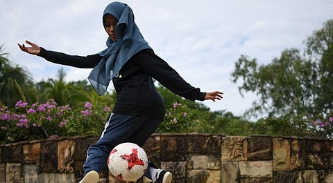 Image of a girl mastering her football skills used for representation (File Photo | AFP)