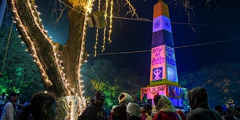 People pay tribute at the 'Jaystambh' monument. (Photo | PTI)