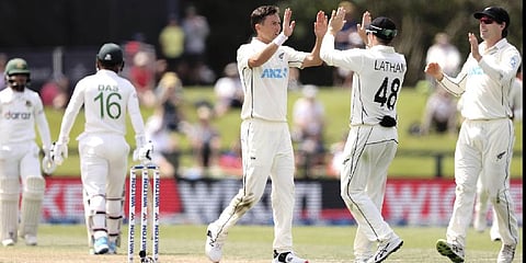 Trent Boult of New Zealand celebrates with Tom Latham during play on day three of the second cricket test between Bangladesh and New Zealand at Hagley Oval in Christchurch, New Zealand.(Photo | AP)