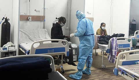 Patient infected with COVID-19 being treated at a Covid-19 care centre at Commonwealth Games (CWG) Village sports complex in New Delhi. (Photo | Parveen Negi, EPS)