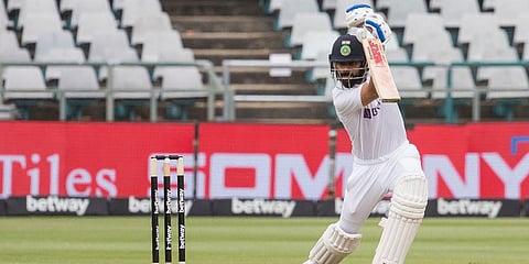 India Test captain Virat Kohli smashes the ball toward the boundary during their third and final Test match against South Africa in Cape Town, South Africa, Jan. 11, 2022. (Photo | AP)
