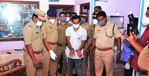 Sanal explaining to the police how he murdered his parents, at his house at Puduppariyaram in Palakkad. | Express
