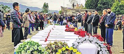 People attend a mass funeral of civilians killed by the Army in a case of mistaken identity, in Mon district of Nagaland. (Photo | PTI)