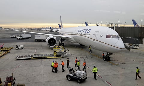 A Boeing Dreamliner 787-10 arriving from Los Angeles pulls up to a gate at Newark Liberty International Airport in Newark, N.J., Monday, Jan. 7, 2019.