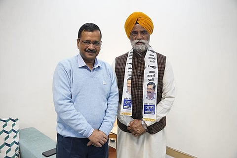 Joginder Singh Mann (Left) with AAP convenor Arvind Kejriwal (Photo | Twitter/AAP)