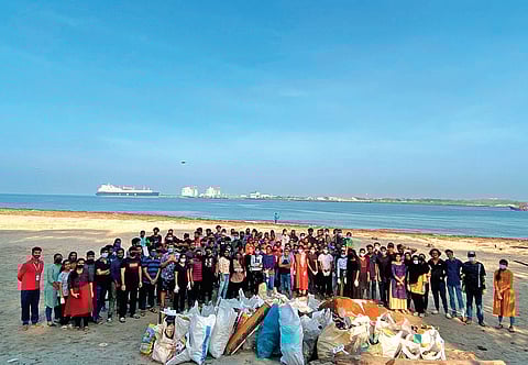 College students and various representatives of DTPC, Kochi Corporation and Cochin Heritage Zone Conservation Society after cleaning the Fort Kochi beach