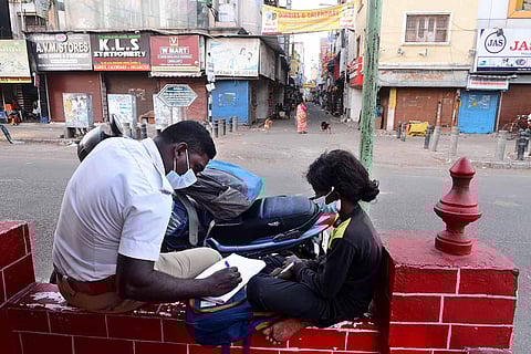 S Mahendran helping Deepika with studies on a Sunday lockdown in Chennai. (Photo | Debadatta Mallick, EPS)