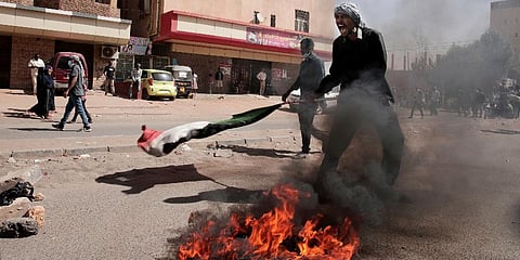 A man shouts during a protest in Khartoum, Jan. 17, 2022. Thousands of people took to the streets to protest the Oct. 25, 2021 coup that has plunged the country into grinding deadlock. (Photo | AP)