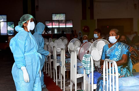 Doctors in PPE suits tend to patients at a Covid Care Centre in Chennai. (Photo | Ashwin Prasath, EPS)