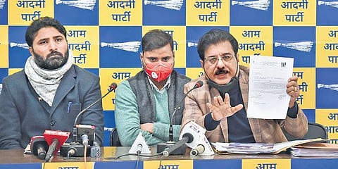 AAP MLA Vishesh Ravi (left) addresses the press conference at party office. (Photo | PTI)