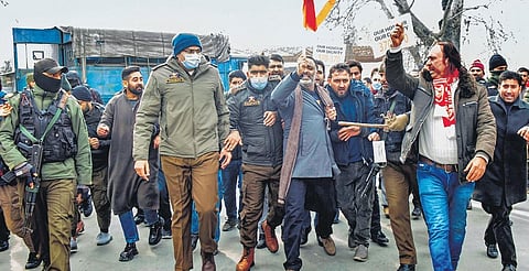 Police remove people from the site where a protest was planned in Srinagar | PTI