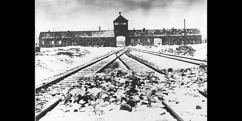 This February/March 1945, file photo shows the entry to the concentration camp Auschwitz-Birkenau in Poland, with snow covered rail tracks leading to the camp. (Photo | AP)