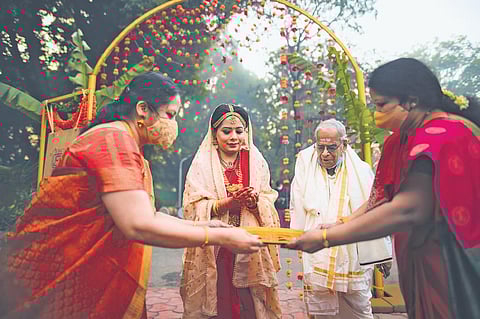 Photographs from Sanjana Anand and Rishabh Gupta’s sustainable wedding. The couple ditched the regular, non-biodegradable embellishments and used flowers for decoration to reduce their carbon footprin