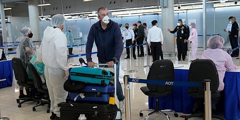 A tourist arrives at Suvarnabhumi International Airport in Bangkok, Thailand. (Photo | AP)