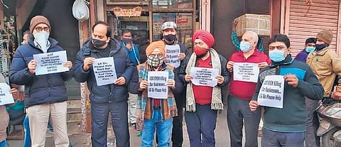 Market association memebers protest against curbs | (Photo | Priyanshi Sharma, EPS)