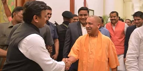 Samajwadi Party chief Akhilesh Yadav with Uttar Pradesh CM Yogi Adiyanath (Photo | PTI)