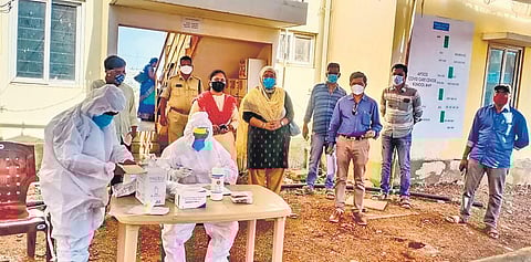 District collector P Koteswara Rao and other officials inspect the facilities at a Covid Care Center set up at Kurnool’s TIDCO housing colony. (Photo | EXPRESS)