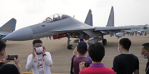 Visitors look at the Chinese military's J-16D electronic warfare airplane.(File Photo | AP)