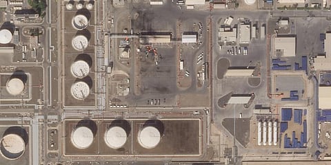 This satellite image provided Planet Labs PBC shows the aftermath of an attack claimed by Yemen's Houthi rebels on an Abu Dhabi National Oil Co. fuel depot in the Mussafah.(Photo | AP)