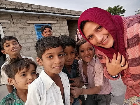 Shahana Nizar with children at Pandhi Ka Par village in Rajasthan