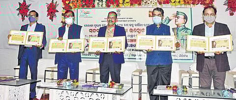 A commemorative postal cover being released at the Netaji Birth Place Museum by officials of India Post, Odisha circle, at Cuttack on Sunday (Photo| Express)