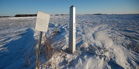 A border marker, between the United States and Canada is shown just outside of Emerson, Manitoba. (Photo | AP)