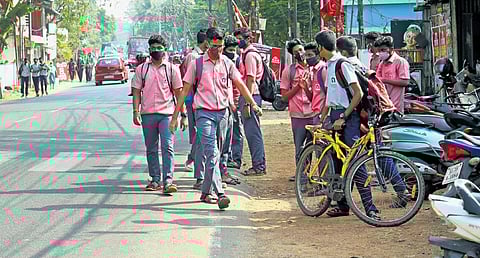Students from SNDP Higher Secondary School after the last day of offline classes. Schools that opened for physical classes have been closed once again after the sudden increase in the number of Covid