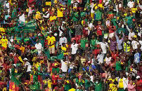 Fans reacts after Cameroon's captain Vincent Aboubakar, scored his team's first goal, during the African Cup of Nations 2022 at the Olembe stadium in Yaounde, Cameroon (Photo | AP)