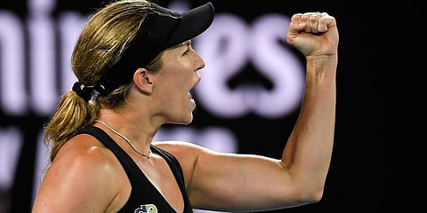 Danielle Collins of the U.S. reacts after winning the first set against Iga Swiatek of Poland during their semifinal match at the Australian Open tennis championships, Jan 27, 2022. (Photo | AP)