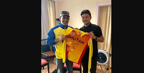 Mikyo Dorji with Mahendra Singh Dhoni
