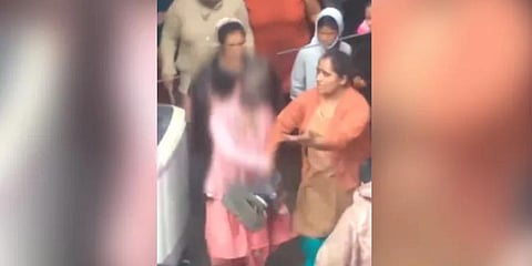 The humiliation was captured in a viral video in which some women are seen beating the woman while others cheer and egg on the perpetrators. (Photo | Swati Jai Hind Twitter)