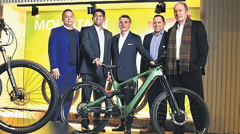 Sudarshan Venu, Joint MD, TVS Motor, Sir Ralf Speth, Chairman designate, TVS Motor, Reto Waeffler - CEO SEMG, and others during the signing in ceremony