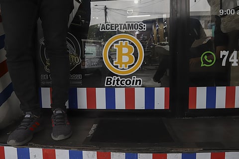 'We accept Bitcoin' is announced at a barber shop in Santa Tecla, El Salvador, Sept. 4, 2021. (File photo | AP)